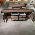 Luxury Coffee Table with Quilted Upholstered Panels Natural Wood Veneer Finish and Stainless Steel Accents